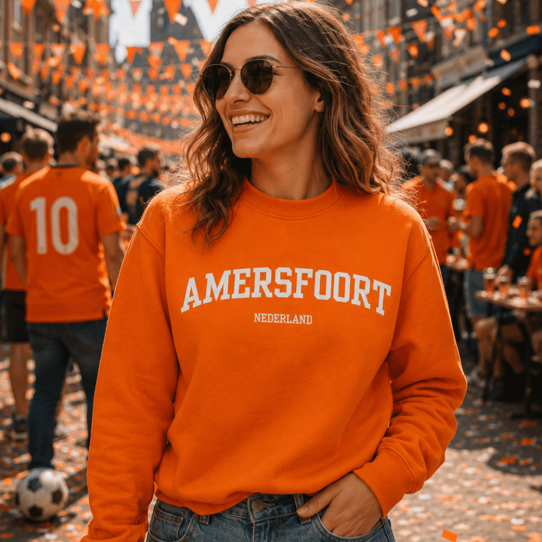 Dame in Amersfoort Oranje Sweater tijdens het WK Voetbal