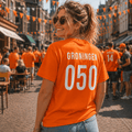 Dame in Oranje Groningen 050 tshirt tijdens WK